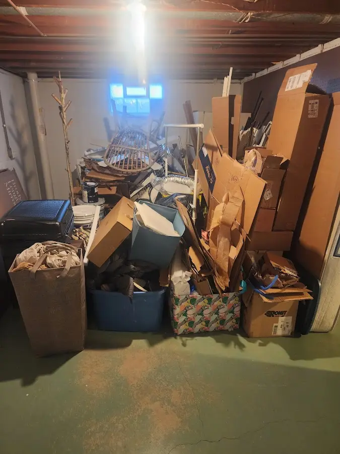 Roll-off dumpster container at job site for Concrete Dumpster Rental in Bloomfield